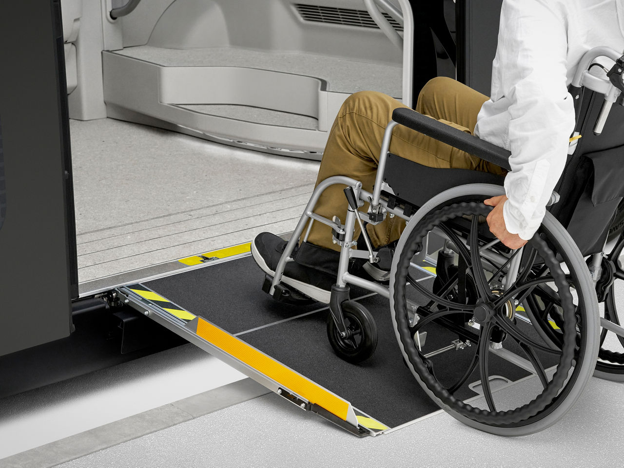Low floor height and electric ramp