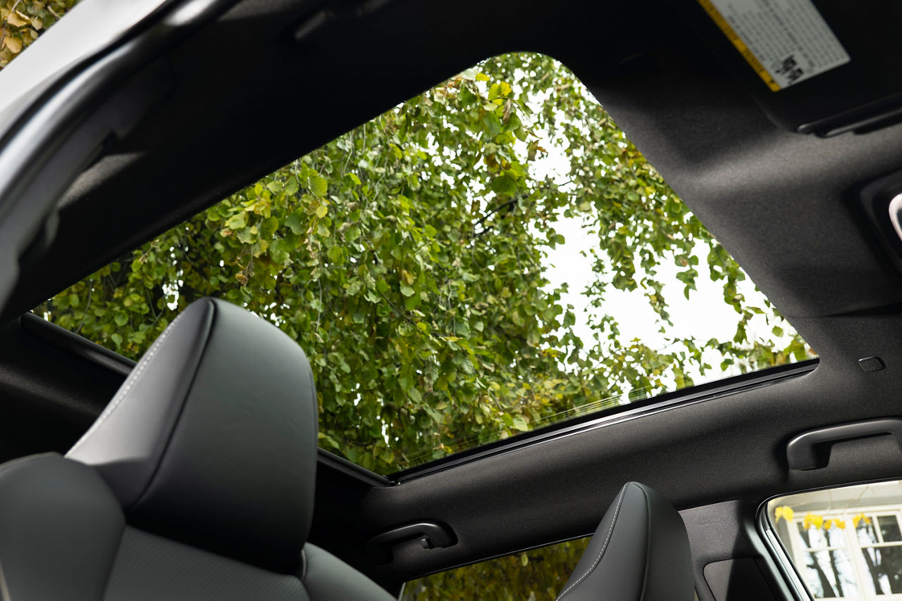 Official Toyota Canada interior image showing the 2026 bZ panoramic glass roof