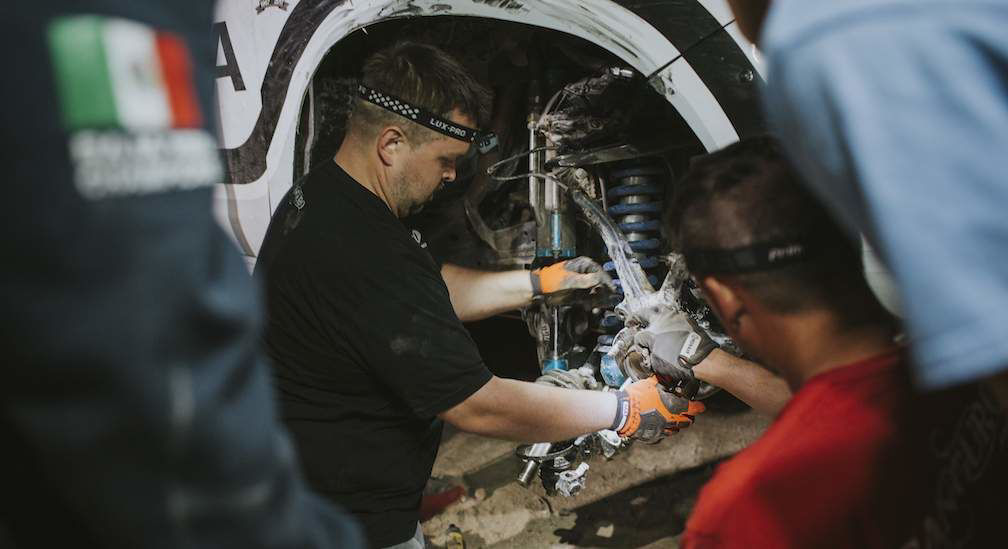 Team-doingmaintenance-on-truck.jpg
