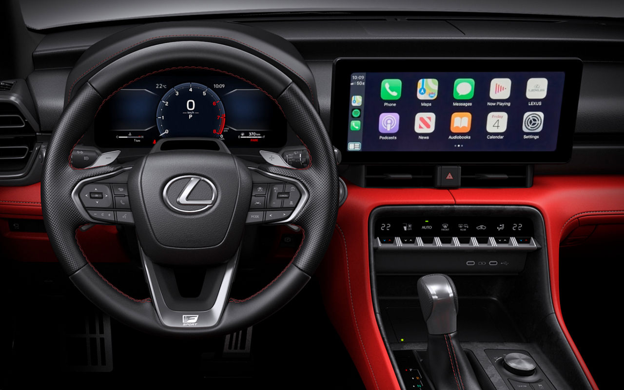 2026 Lexus IS 350 F SPORT interior dashboard and steering wheel with red trim