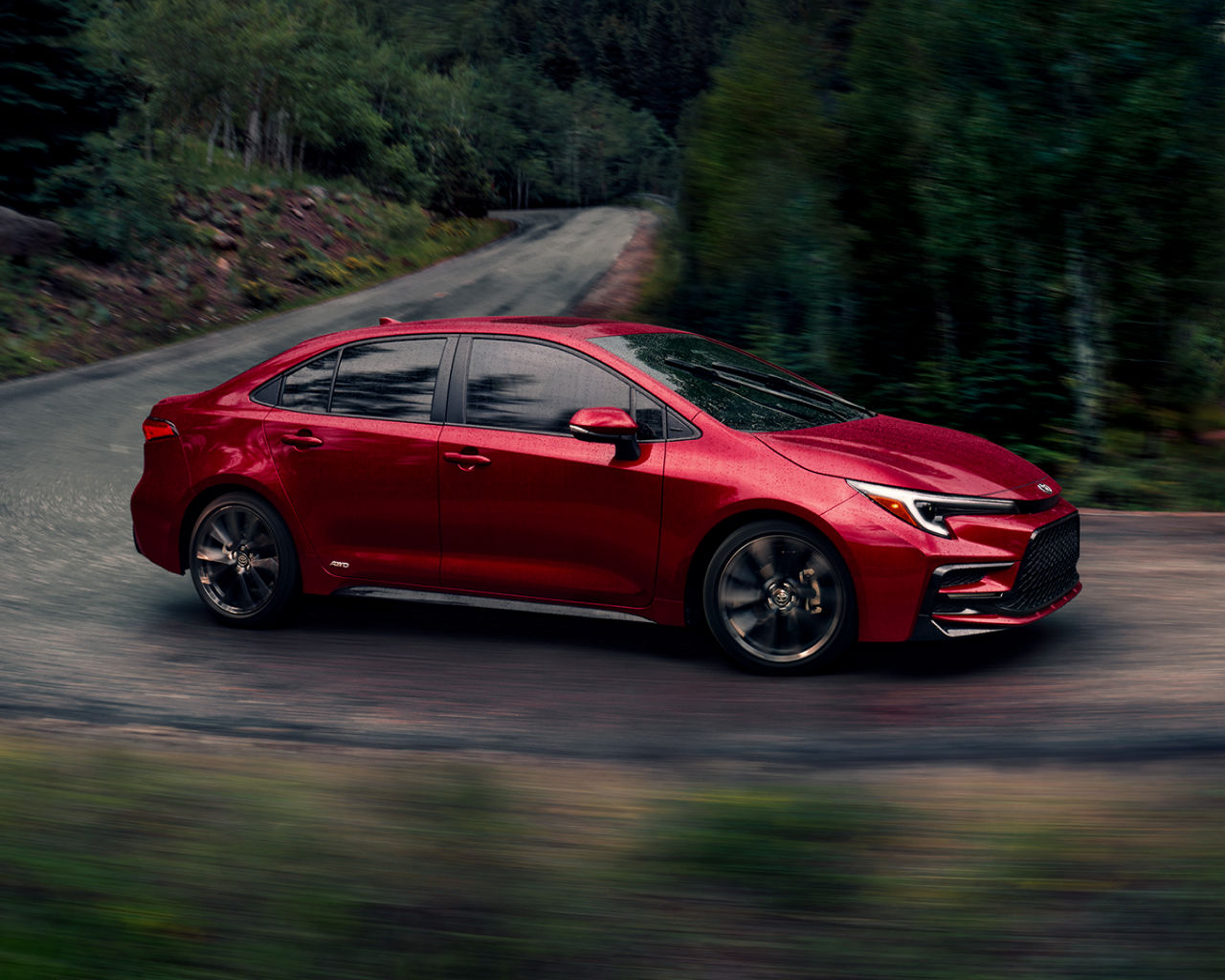 toyota-2025-corolla-hybrid-xse-awd-ruby-flare-pearl-profile-l