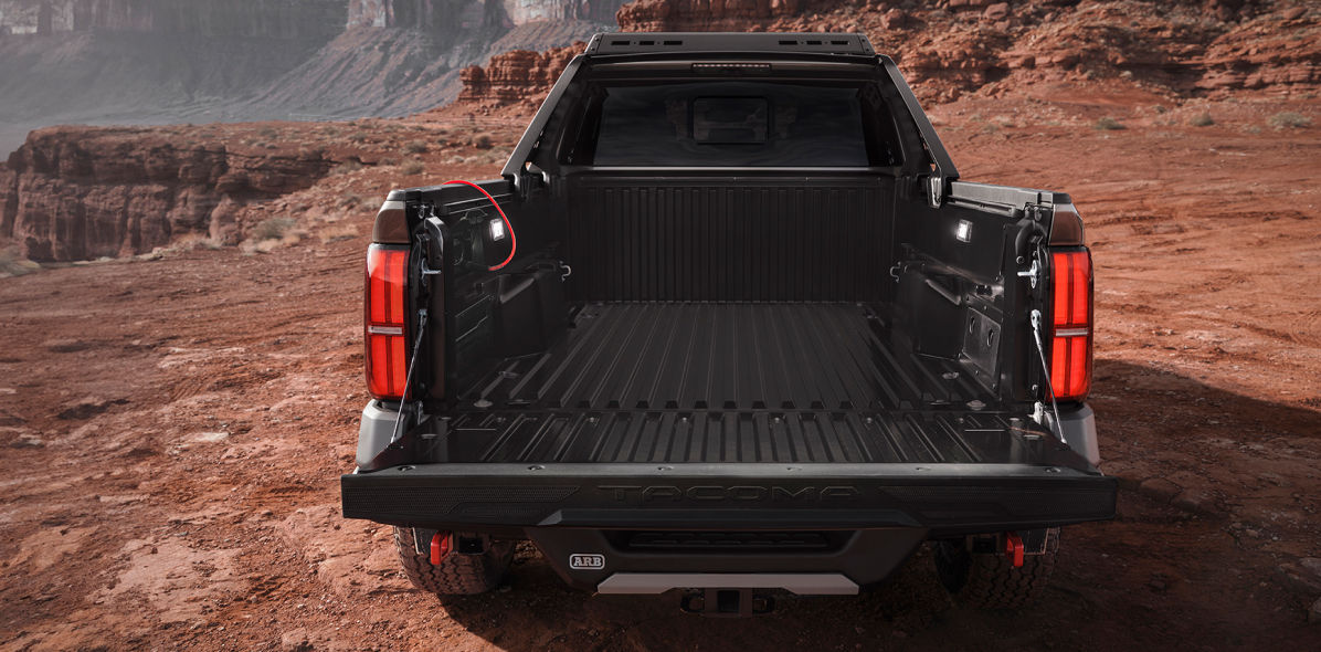 toyota-2025-features-design-tacoma-trailhunter-oxide-bronze-tailgate-l