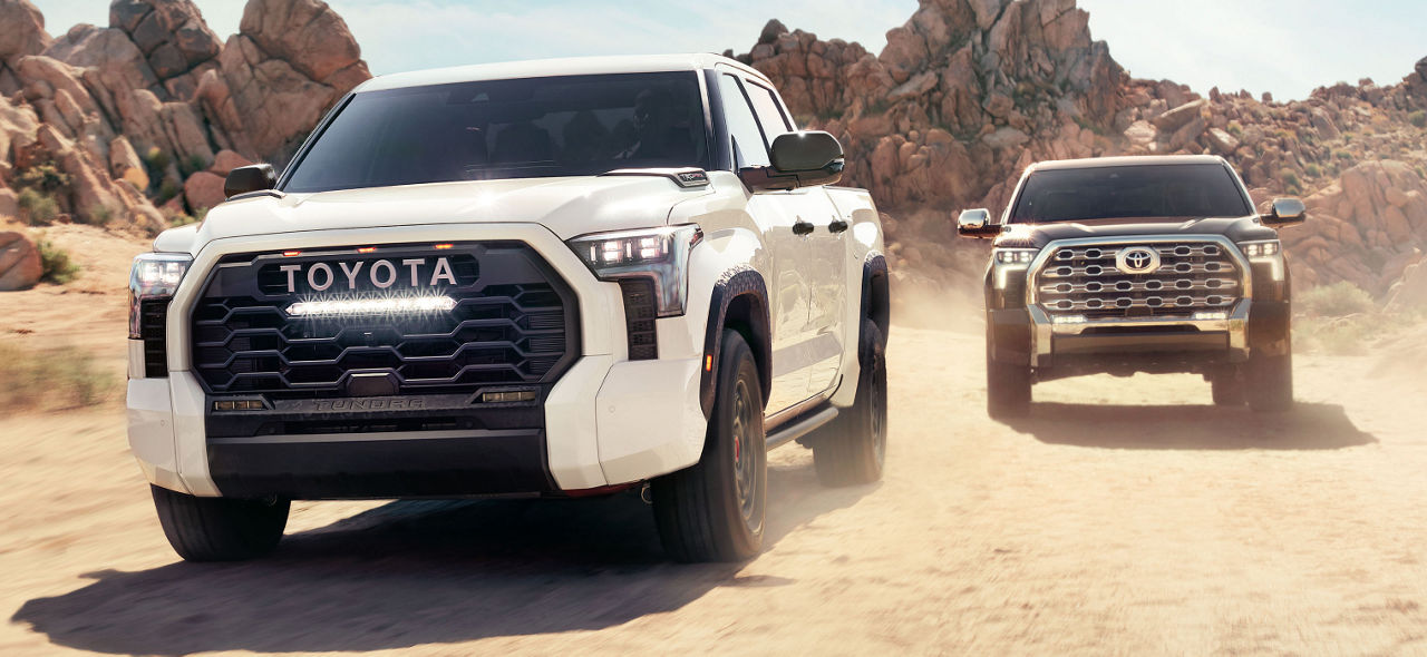 toyota-trucks-family-lineup-2025-tundra-hybrid-limited-trd-pro-white-1794-smoked-mesquite-brawn-and-brains-l